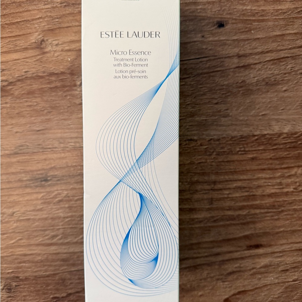 Estee Lauder Micro Essence Treatment Lotion - White with Blue Accents